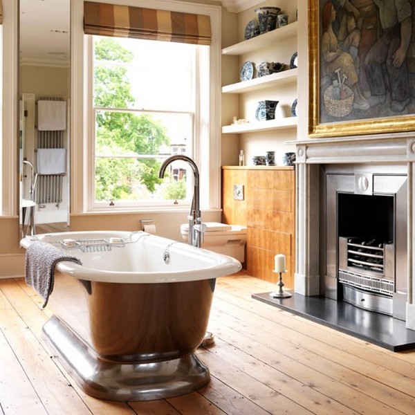 Luxurious-bathroom-with-fireplace-and-pewter-freestanding-bath