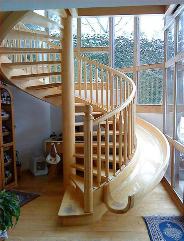 wooden-spiral-staircase-with-slide-beside-it-3
